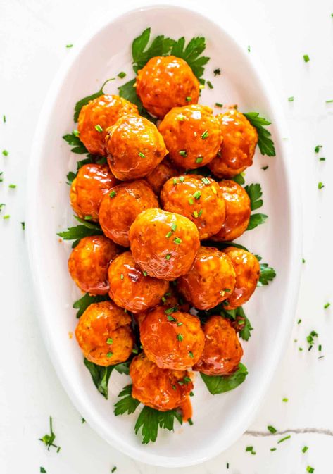 These Crockpot Buffalo Chicken Meatballs are spicy little bites of deliciousness that are out of this world, super easy and quick to make! #crockpot #buffalo #chicken #meatballs #recipe Slow Cooker Buffalo Chicken Meatballs, Buffalo Chicken Dip Blue Cheese, Ground Buffalo Chicken, Buffalo Chicken Meatballs Crockpot, Chicken Meatballs Crockpot, Crockpot Buffalo Chicken Dip, Chicken Meatballs Recipe, Buffalo Chicken Dip Crock Pot, Buffalo Chicken Bites