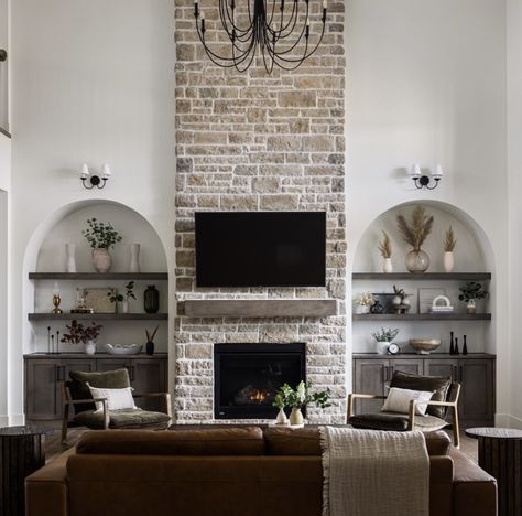 Stone Fireplace With Vaulted Ceiling, 2 Story Fireplace With Built Ins, Two Story Fireplace With Built Ins, Stone Fireplace With Tv Above Mantle, Stone Fireplace With Built Ins On Both Sides, Stone Fireplace Halfway Up Wall, Tall Stone Fireplace Wall High Ceilings, Tall Stone Fireplace, Stone Fireplace With Arched Built Ins