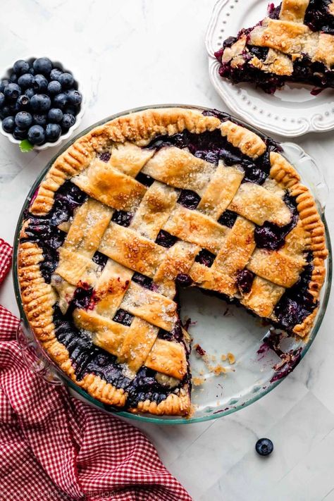 This better-than-ever homemade blueberry pie is bursting with a sweet juicy blueberry filling that pairs perfectly with a golden-brown buttery, flaky pie crust. The filling sets perfectly and is neither soupy nor runny. Your time and effort will be rewarded with every satisfying from-scratch slice! Recipe on sallysbakingaddiction.com Best Blueberry Pie Recipe, Easy Blueberry Pie, Fresh Blueberry Pie, Blueberry Pie Recipe, Homemade Blueberry Pie, Easy Pie Crust, Easy Blueberry, Easy Pie, Fruit Pie