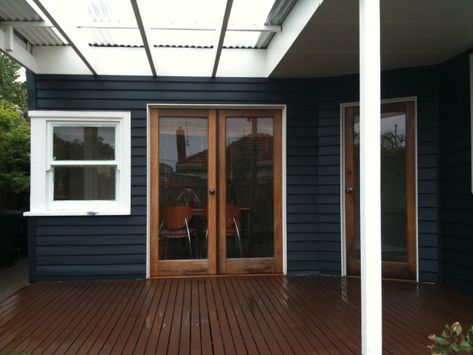 Inky dark blue exterior with white and timber trim Exterior House Paint Colors, Dark Blue Houses, Dulux White, Dark Wood Trim, House Paint Colors, Exterior House Paint, Weatherboard House, Best Exterior Paint, House Paint Color Combination