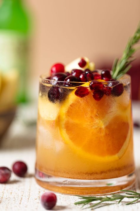 Thanksgiving Punch Mocktail - Orchids + Sweet Tea Fall Punch Mocktail, Thanksgiving Drink Ideas Non Alcoholic, Thanksgiving Mocktail Punch, Thanksgiving Drink Station Ideas, Mocktail Thanksgiving Drinks, Thanksgiving Vodka Cocktails, Thanksgiving Signature Cocktail, Mocktail Thanksgiving, Fall Party Drink Ideas