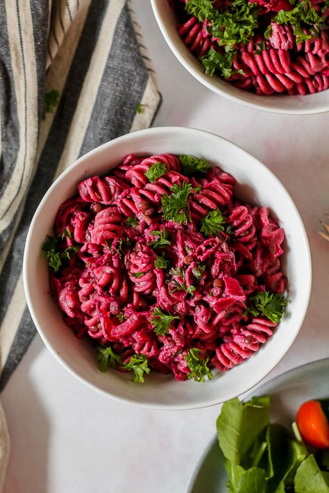 Looking for a different and delicious way to cook with beets? Look no further than this beet lentil pasta with feta walnut sauce. Shredded beets are cooked with lots of onion, garlic, and tangy-sweet balsamic, then tossed with creamy feta walnut sauce and pasta for the perfect healthy comfort pasta dinner. Beet And Feta Pasta, Roasted Beet Pasta, Beet Sauce Pasta, Vegan Beet Pasta Sauce, Beet Pasta Sauce, Shredded Beets, Beet Sandwich, Pasta With Feta, Beet Pasta