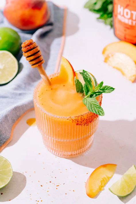 Frozen Hot Honey Peach Margarita - The Social Sipper Food Poetry, Peach Margaritas, Honey Cocktail, Peach Margarita, Honey Drink, Frozen Margarita, Frozen Peaches, Frozen Margaritas, Easy Cocktail