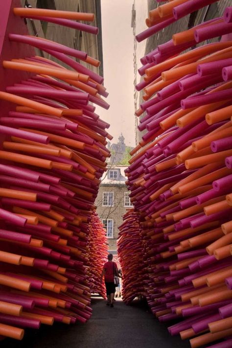 Hundreds of pool noodles invaded an abandoned alley in Quebec City, Canada as part of Delirious Frites, an architectural art installation created by Les Astronautes. Urban Art Installation, Tactical Urbanism, Quebec City Canada, Architectural Art, Pool Noodles, Interactive Art, Art Installation, Quebec City, Orange And Pink