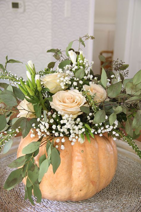 Try these easy ways to create easy pumpkin flower arrangements for your Thanksgiving table centerpiece! No need to carve your pumpkin to make a flower arrangement this fall! easy pumpkin flower arrangement | diy pumpkin flower arrangement | diy flower arrangement | pumpkin floral centerpiece | pumpkin centerpiece | diy thanksgiving centerpiece | easy fall centerpiece | fall centerpiece | fall table arrangement | fall table decor | fall table decorations | fall table setting | no carve pumpkin Pumpkin Flower Arrangements, Pumpkin Centerpieces Diy, Pumpkin Flower Arrangement, Thanksgiving Flower Arrangements, Flower Arrangement Diy, Diy Flower Arrangement, Pumpkin Floral Arrangements, Fall Pumpkin Centerpieces, Thanksgiving Floral