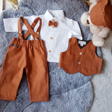 Burnt Orange Vest Wedding, Ring Bearer Burnt Orange, Terracotta Country Wedding, End Of Summer Wedding Ideas, Ring Bearer Fall Wedding, Fall Ring Bearer Outfit, Boho Ring Bearer Outfit, Ring Bearer Outfit Fall, Groom Suit Fall Wedding