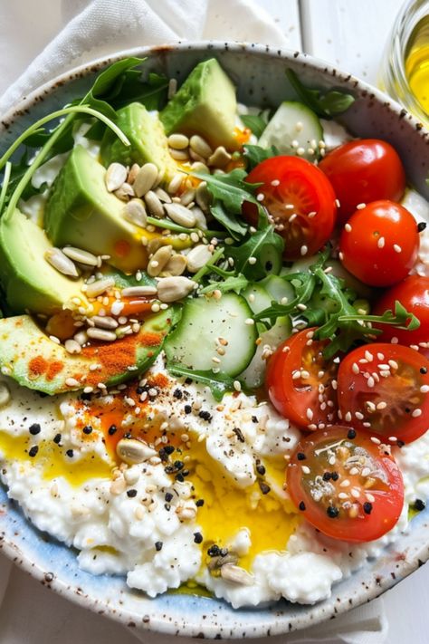 Explore the delightful combination of cottage cheese and avocado in this nourishing bowl recipe. Packed with protein, healthy fats, and fiber, this dish is perfect for a quick and satisfying meal any time of the day. Creamy cottage cheese pairs perfectly with creamy avocado, creating a harmony of flavors that will leave your taste buds wanting more. Customize your bowl with your favorite toppings like nuts, seeds, or herbs for an extra crunch. 

Ingredients
1 ripe avocado
150g (5 oz) cottage che Avocado And Cottage Cheese, Cottage Cheese Pairings, Cottage Cheese And Avocado, Cottage Cheese Salad Recipes, Cottage Cheese Avocado, Avocado Cottage Cheese, Cottage Cheese Bowl, Postpartum Recipes, Cheese Salad Recipes