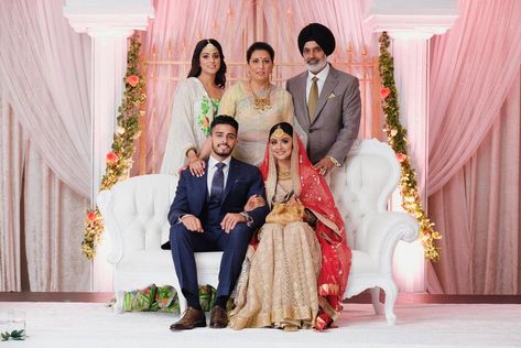 A Gorgeous Engagement With Minimal Decor And Eye-Catching Outfits | WedMeGood Punjabi Engagement Look, Blush Pink Indian Wedding Dress, Pink Lehnga Dress Couple, Punjabi Engagement, Family Photo Wedding Indian, Chunni Ceremony, Suit Couple, Pink Lehenga Bride And Groom, Anant Ambani And Radhika Merchant Pre Wedding