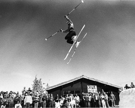 A member of the Aspen Highlands Ski Patrol jumps over the crowd in a popular and exciting daily exhibition at the Cloud Nine Picnic Cabin, 1975. Aspen Restaurants, Aspen Skiing, Ski Party, Ski Patrol, Aspen Snowmass, Ski Instructor, Ski Club, Ski Posters, Ski Chalet