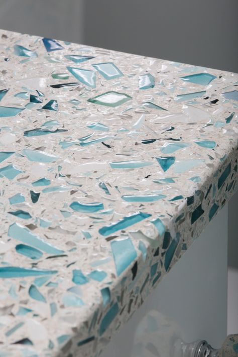 Floating Blue Vetrazzo recycled glass surfaces are taken to the next level with… Beach Cottage Kitchens, Coastal Cottages, Cottage Decorating, Glass Countertops, Honeycomb Blinds, Regal Design, 카페 인테리어 디자인, Beach House Interior, Beach Cottage Style