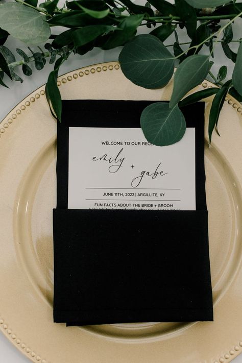 Adding a black napkin and a cute informational card over our chargers helped elevate our table setting and allowed for the guest to have something to read during cocktail hour. Black Wedding Table Setting, Wedding Napkin Folding, Place Setting Cards, Black And Gold Wedding, White Weddings Reception, Black And White Wedding Theme, Black Napkins, Wedding Table Setting, Gold Chargers