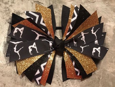 Black and Gold Gymnastics Hair Bow, Gymnastics Pony Tie, Gymnastics Bow, Gold Gymnastics Bow, Gymnastics Ribbon, Gymnastics hair tie #etsy #accessories #hair #scrunchie #black #white #blackgymnasticsbow #blackandgold #gymnasticsponytie #goldgymnastics Ribbon Gymnastics, Gymnastics Ribbon, Dance Bows, Gold Hair Bow, Track Hairstyles, Gymnastics Hair, Gymnastics Gifts, Sport Gymnastics, Medium Long Hair