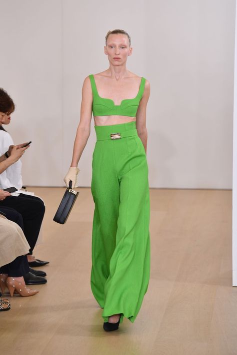 Bra Tops:  If you thought bra tops were born thanks to Instagram, boy, are you wrong. They were beyond huge in the ’70s. This neon-green version from Emilia Wickstead’s spring ’19 show at London Fashion Week is a modern take on the retro look. 70s Fashion For Women, 70s Swimwear, 70s Fashion African American, 70s Fashion Trends, Retro 70s Fashion, 1970s Outfits, Leotard Fashion, Into Fashion, Office Fashion Women