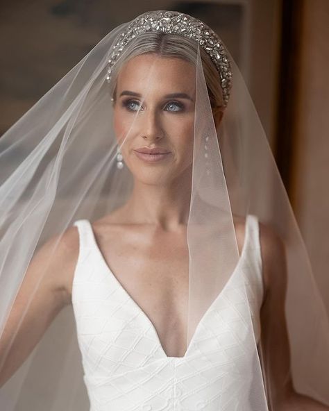 Bride @madeleine.robertss wore the Medici Headband by Jennifer Behr with her veil. Find more bridal inspiration and shop the collection at jenniferbehr.com Photo @lamomentphotography Hair @hairbychanellemandile Makeup @klo.makeup Gown @kwhbridal Wedding Hairstyles With Veil Over Face, Drop Veil With Headband, Sleek Bridal Bun With Headband, Tiara Wedding Hair Veils, Head Band Veil, Bride Hair With Headband And Veil, Wedding Veil With Headband, Hair Down With Headband Wedding, Bride Hair Accessories With Veil