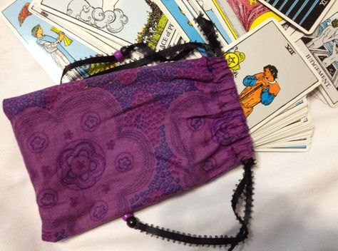 Make this simple drawstring Tarot bag with a few scraps of fabric, some ribbon, and a couple of pony beads, and use it to store your Tarot cards. Simple Drawstring Bag, Crochet Tarot, Diy Tarot Cards, What Are Tarot Cards, Tarot Card Bag, Scraps Of Fabric, Pagan Crafts, Learning Tarot Cards, Tarot Bags