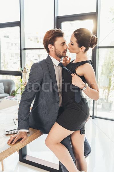 Woman pulling man by necktie stock photo (c) LightFieldStudios (#8479948) | Stockfresh Man Leaning On Table, Man In Suit Sitting, Woman In Black Dress, Dress And High Heels, Man In Suit, Woman In Black, Couple Poses Reference, Anatomy Poses, Women Ties