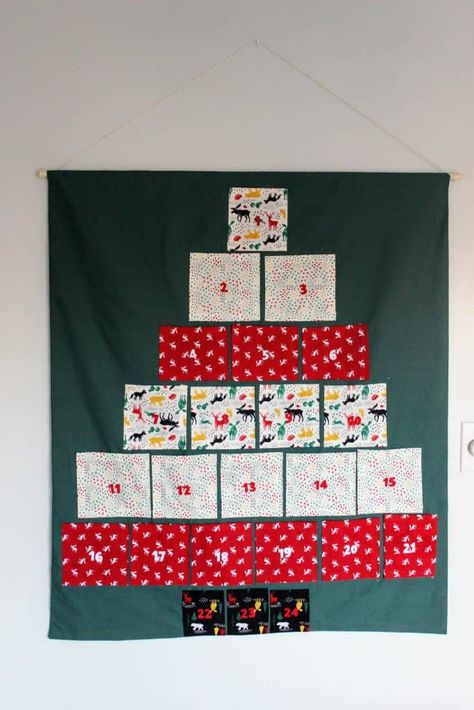 Make your own pocket advent calendar to be filled with Christmas treats or winter activities for the family to do together. This is a simple diy craft. Pocket Advent Calendar, Advent Calendar Fillers, Advent Calendar Gifts, Calendar Gifts, Number Stickers, Fabric Glue, Fabric Markers, After Christmas, Simple Diy