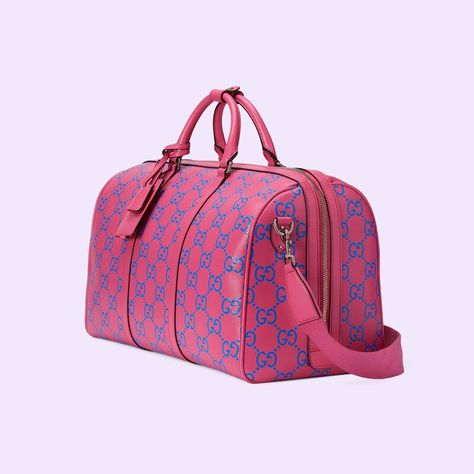 Shop the GG embossed duffle bag in pink at GUCCI.COM. Enjoy Free Shipping and Complimentary Gift Wrapping. Gucci Duffle Bag, Travel Bags For Men, Gucci Luggage, Gucci Travel Bag, Weekend Bags, Cute Luggage, Gucci Store, Guccio Gucci, Mens Travel Bag