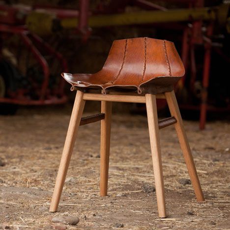 Here are some more images of boiled leather furniture by Tortie Hoare, the winning project from New Designers Part 2 2010 (see our earlier story). The collection is made up of two seats, a desk, side table, stool and stand, all upholstered with leather boiled in water to make it rigid. The chair above has also been upholstered with linen, and Pet Sofa Cover, Inflatable Furniture, Leather Stool, Low Stool, Leather Decor, Furniture Protectors, Leather Furniture, Interior Furniture, Leather Chair