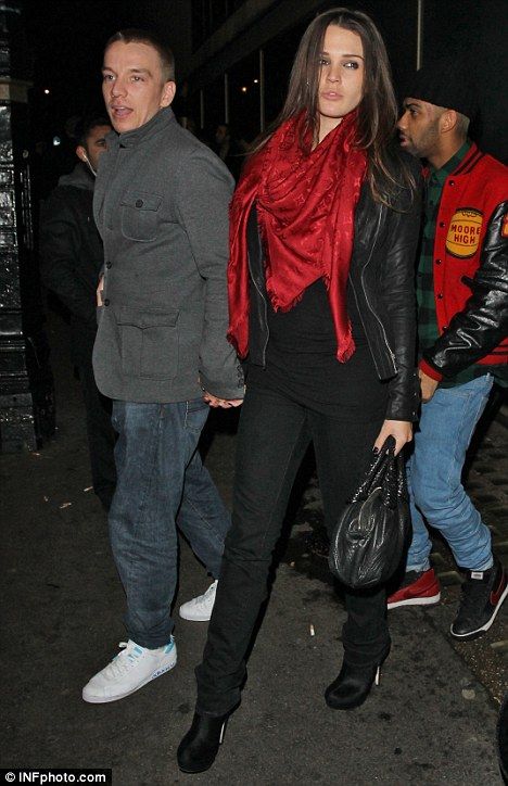 Party queen: Danielle was dressed in full black with a leather jacket and red scarf Red Lv Scarf Outfit, Lv Scarf Outfit, Red Scarf Outfit, Louis Vuitton Monogram Shawl, Lv Scarf, Party Queen, Louis Vuitton Red, Scarf Outfit, Red Scarf