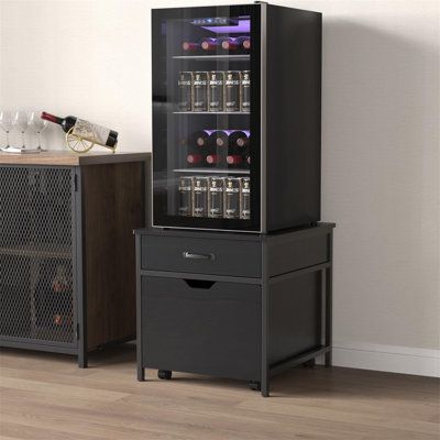 Sturdy Structure: The sturdy iron stand ensures the sturdiness of this mini fridge table, and the desktop can support up to 220 pounds. Even if you put a fully loaded mini fridge on it, you don't have to worry about stability and safety. | Rebrilliant Mini Fridge Stand w/ Storage | C111176854 | Wayfair Canada Mini Fridge Table, Fridge Table, Fridge Stand, Mini Fridge Cabinet, Mini Fridge Stand, Fridge Cabinet, Cabinet Table, Small Fridges, Iron Stand