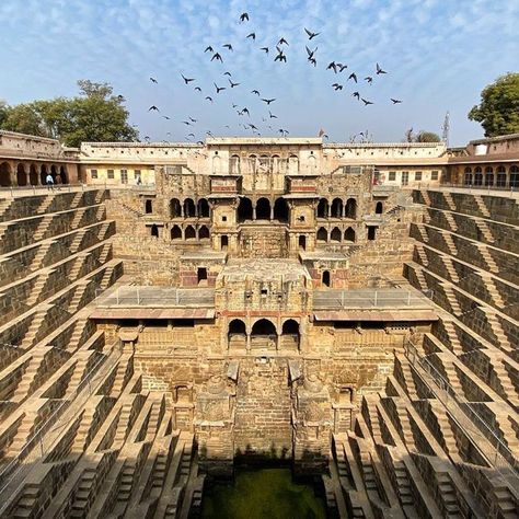 The village of Abhaneri is believed to be established by the King Raja Chand. Originally Abhaneri was named as Abha Nagri, which means the city of brightness, but due to the mispronunciation of the term, it is changed to the present name. Step wells are the unique concept of India. These big tanks were used as cool places of resort and water reservoir in parched days. It was a ritual to wash hands and feet before visiting the temple. Adjoining the Chand Baori, Chand Baori is one of the oldest an Chand Baori, Jaipur Travel, Agra Fort, Cool Places, Water Reservoir, Pictures Of People, Udaipur, Round Trip, Ancient Civilizations