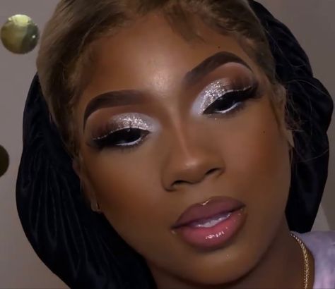 Makeup With White Under Eyeliner, Silver Make Up Looks Black Women, Natural Makeup For Black Women Silver, Silver Under Eye Makeup, Silver Birthday Makeup For Black Women, Silver Natural Glam Makeup Black Women, White Under Eyeliner Makeup, Soft Silver Glam Makeup, Prom Makeup Black Women Silver