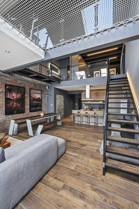 Condo of the Week: $1.5 million for a Beaches loft with a floor made out of a hammock Modern Industrial Loft, Corrugated Metal Wall, Log Bench, Wild Design, Tiny Office, Toronto Life, Floating Vanity, Lake Ontario, The Don