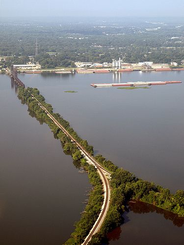 The  Norfolk Southern Tennessee River Bridge is a vertical lift drawbridge, Decatur, Alabama. The railroad crosses the River and enters the oldest part of the downtown historic business district. The North-South rails in Decatur have been continuously operated since 1855 and played a major role in the Civil War. East-West rails have been operated since 1833 and were the rail route for the Trail of Tears. Southern Tennessee, Decatur Alabama, Railroad Bridge, River Bridge, Trail Of Tears, Norfolk Southern, Tennessee River, Spring Awakening, Sweet Home Alabama