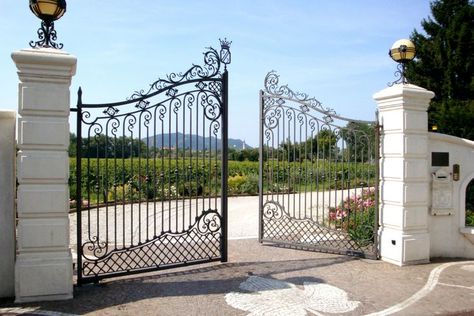 Wrought iron swing driveways gate manufactured in Italy and completely integrated in the bucolic aesthetics of this luxury countryside villa. Italian design and craftsmanship. Security Door Design, Contemporary Gates, Gates Design, Neoclassical Design, Art Passion, Doors Ideas, Wrought Iron Gate, Electric Gates, Front Gates