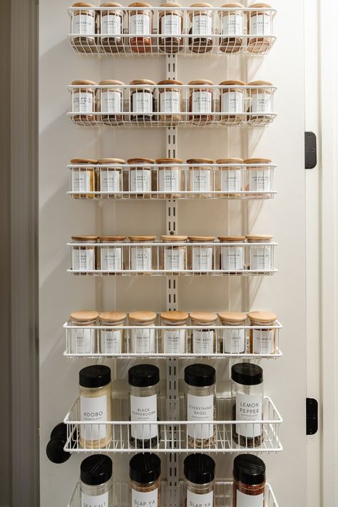 Use The Container Store Elfa over the door storage system to create a pantry spice rack with matching glass spice jars and labels. Spice Organization Pantry, Spice Rack On Pantry Door, Small Pantry Makeover, Pantry Door Spice Rack, Small Pantry Organization Ideas, Pantry Door Storage, Door Spice Rack, Pantry Organization Labels, Spice Rack Organization