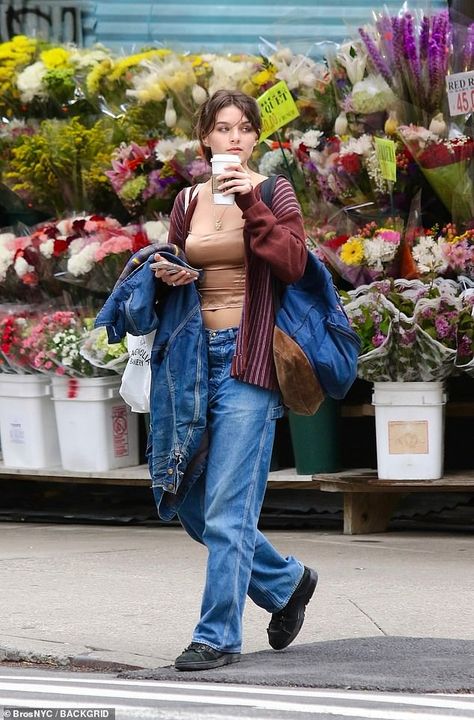 Just hours before Katie's outing, Suri looked like the spitting image of her mother from her Dawson's Creek days as she stepped out on her 18th birthday Suri Cruise Fashion, Joey Potter, Suri Cruise, Dawson's Creek, Cruise Fashion, Spitting Image, Burgundy Cardigan, 2024 Style, Patterned Jeans