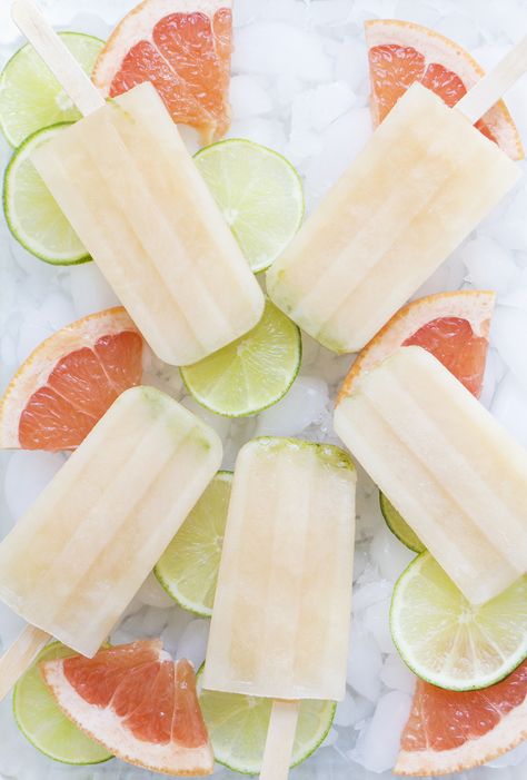 Recently I created a summer cocktail recipe for Jose Cuervo and shared it on my Instagram. It was a classic Paloma cocktail (grapefruit soda + silver tequila) which I “garnished” with a Grapefruit Lime Paleta.   While I initially intended for these pops to be nothing more than a delicious garnish, they ended up being … Paletas Recipes, Lime Popsicles, Grapefruit Recipes, Frozen Cocktail, Yogurt Pops, Frozen Dessert Recipe, Cold Treats, Summer Cocktail Recipes, Ice Cream Popsicles