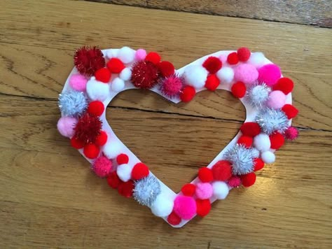 Pom Pom Heart Wreath. Valentine Craft for Kids. The Chirping Moms: 35 Valentine Crafts & Activities for Kids Valentine Preschool, Toddler Valentine Crafts, February Crafts, Easy Valentine Crafts, Valentine Craft, Valentinstag Party, Valentine's Day Crafts For Kids, Preschool Valentines, Valentine Activities