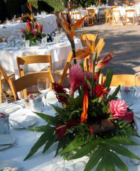 tropical centerpiece for round reception tables: birds of paradise, anthuriums, bromeliads, orchids, orange tiger lilies, monstera leaves Luau Centerpieces, Cuban Wedding, Wedding Centerpeices, Wedding Table Deco, Tropical Wedding Centerpieces, Tropical Centerpieces, Cheap Wedding Centerpieces, Tropical Wedding Inspiration, Exotic Wedding