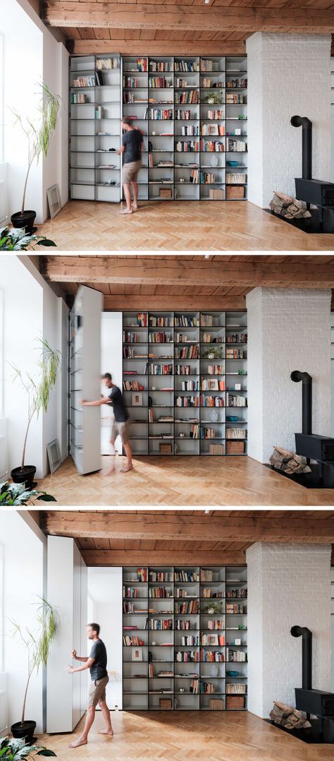 A bedroom hides behind this bookcase and is accessed through a secret door. Gömda Rum, Dold Dörr, Skjulte Rum, Floor To Ceiling Bookshelves, Bookshelf Door, Bookcase Door, Flooring For Stairs, Hidden Rooms, Secret Door