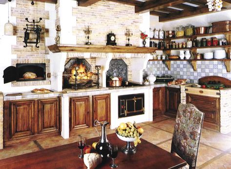 I really like the natural wood and brick colors in this kitchen. My favorite features are the bread oven, fireplace, and shelving. Spanish Kitchen Design, Fabulous Homes, European Kitchen Design, Rustic Italian Home, Decoration Ideas Living Room, French Kitchens, Italian Kitchens, Counter Cabinet, Old World Kitchens