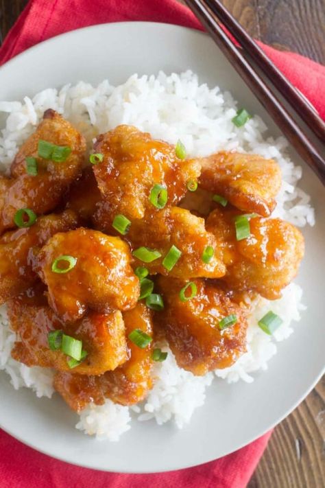 Skip the take out - this Sweet and Sour Chicken Recipe is so good that you’ll put it on the permanent rotation. Chicken is coated in a sweet and sticky sauce and baked to perfection. Baked Sweet And Sour Chicken Recipe, Baked Sweet And Sour Chicken, Sweet And Sour Chicken Recipe, Sour Chicken Recipe, Sticky Sauce, Chicken Over Rice, Sweet And Sour Chicken, Sweet Sour Chicken, Sweet N Sour Chicken