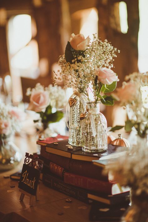 Wedding Book Decor, Centerpieces With Books, Alnwick Treehouse Wedding, Alnwick Treehouse, Book Wedding Centerpieces, Centrepiece Flowers, Book And Flowers, Pink Gypsophila, Treehouse Wedding