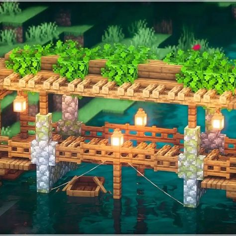 Are you looking for a plain, simple wooden bridge that blends naturally with nature? Then this bridge is for you! It's made with stone pillars, lanterns, and a decorative way of placing leaves on top. The ingenious use of ropes and campfire as flooring added depth to this build. Boats can even travel below this bridge! It has so much functionality with just a simple appearance. Check it out now and try this out in your survival world. Minecraft Cottage House, Minecraft Bridge, Bridge Ideas, Minecraft House Ideas, Minecraft Blocks, Cube Games, Minecraft Farm, Minecraft Cottage, Easy Minecraft Houses