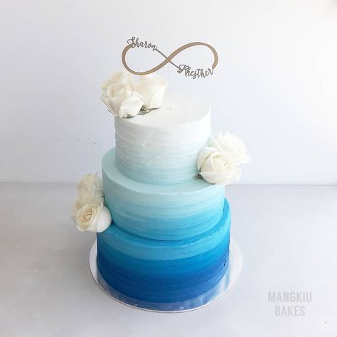 Blue ombre with stiff icing exterior. Please note stiff icing is NOT buttercream icing. We use them especially for weddings and… Blue Ombre Buttercream Cake, Blue Ombre Cake Birthdays, Conformation Party, Cake Smash Blue, Blue Ombre Cake, Light Blue Wedding Cake, Ombre Cakes, Wedding Cake Ombre, Cake Boy