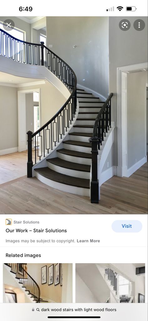 Light Wood Floors Dark Stairs, Dark Stair Treads Light Floors, Dark Wood Stairs With Light Floors, Light Floors Dark Stairs, Dark Stairs Light Floors, Townhouse Flooring, Vinyl Plank Flooring Stairs, Dark Wood Staircase, Dark Vinyl Plank Flooring