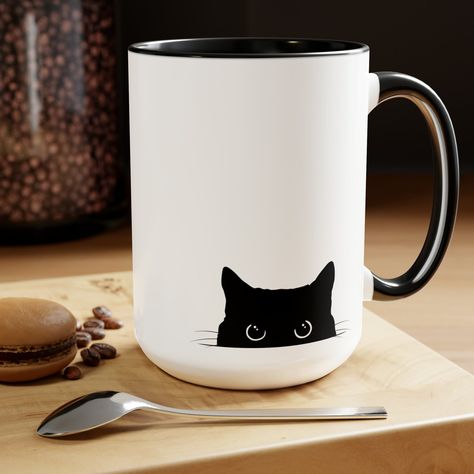 If you have any special custom requests, please send us a message! Peeking black cat is printed on both sides of the mug. The mug is 15oz and comes in 5 colors, black being the most popular purchase. We aim to process all orders as fast as possible and ship them within 1-5 days. However, during sales or busy periods please allow up to 7-10 business days for processing. All orders are shipped from the US (Florida & California). Once your order is dispatched, you will receive a notification containing the tracking number and a link to the tracking website, which will allow you to monitor the parcel's way to your door. In most countries, you will also be able to track it using your local post's website services, using the number provided by us. Refunds or exchanges are accepted only for the f Black Mug, Cat Coffee Cups, Cat Coffee Mug, Cat Coffee, Cat Mug, Black Coffee, Cat Owners, Cat Theme, Cat Lover Gifts