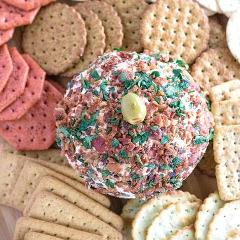 This Bloody Mary Cheese Ball has all the flavors you love in the classic beverage and is the perfect appetizer for your next brunch! #BloodyMary #CheeseBall #appetizer #brunch #SweetBeginningsBlog Blood Mary, Prepared Horseradish, White Cheddar Cheese, 2000 Calories, 2000 Calorie Diet, Green Olives, Creamy Cheese, Crumbled Bacon, Perfect Appetizers