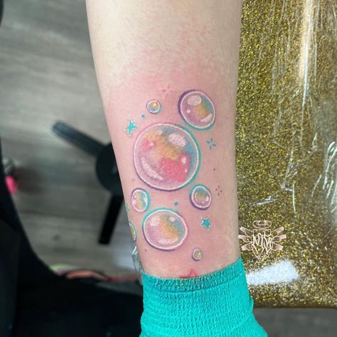 A bit angry but this was such a fun cute full color tattoo for @dreametri 💖💖🫧🫧 . . . Made @companiontattoo . . . #bubbles #colorbubbles #ka… | Instagram Real Glitter Tattoo Ideas, Fun Color Tattoos, Bubble Wand Tattoo, Color Full Tattoo, Glitter Tattoos Real, Bubbles Tattoos, Tattoo Bubbles, Colorful Tattoo Sleeve, Cute Colorful Tattoos