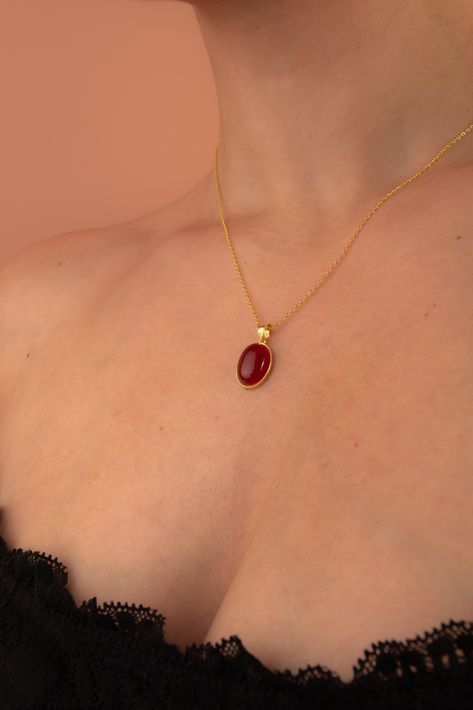 Dainty 14k gold necklace showcasing a radiant Carnelian pendant, an elegant addition to any jewelry collection. Elegant Crystal Jewelry, Orange Jewelry, Carnelian Pendant, Carnelian Jewelry, Carnelian Necklace, Trendy Fashion Jewelry, Bridal Gold Jewellery Designs, Pendent Necklace, Ruby Necklace