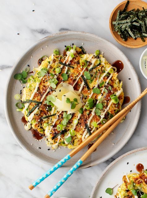 Okonomiyaki - or Japanese savory pancakes - are SO delicious and easy to make! This vegetarian recipe uses basic ingredients and comes together in under 30 minutes. Load it up with your favorite toppings, and enjoy! | Love and Lemons #vegetarian #japanesefood #okonomiyaki #cabbage Japanese Dinner Recipes, Okonomiyaki Recipe, Dinner Recipes Vegetarian, Japanese Pancake, Japanese Dinner, Vegan Worcestershire Sauce, Japanese Street Food, Savory Pancakes, Vegetarian Cabbage