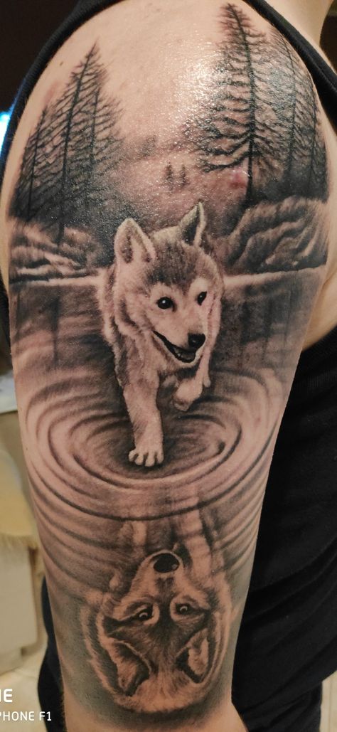 Smaller wolf is reflecting into a bigger version of himself. Wolf Lake Tattoo, Prowling Wolf Tattoo, Wolf Reflection Tattoo, Gnarly Tattoos, Reflection Tattoo, Lake Tattoo, Small Tattoos With Meaning, Wolf Face, Wolf Pup