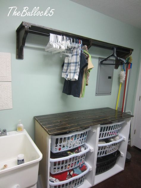 Organized Laundry, Laundry Room Storage Shelves, Laundry Basket Storage, Small Laundry Room Organization, Room Storage Diy, Laundry Room Shelves, Farmhouse Laundry Room, Clothes Hanging, Laundry Room Remodel