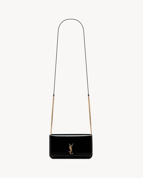 Discover BLACK CASSANDRE phone holder IN PATENT LEATHER from Saint Laurent online store. Europe Shopping, I Got It, Phone Bag, Got It, Phone Holder, Yves Saint Laurent, Patent Leather, Saint Laurent, Wish List